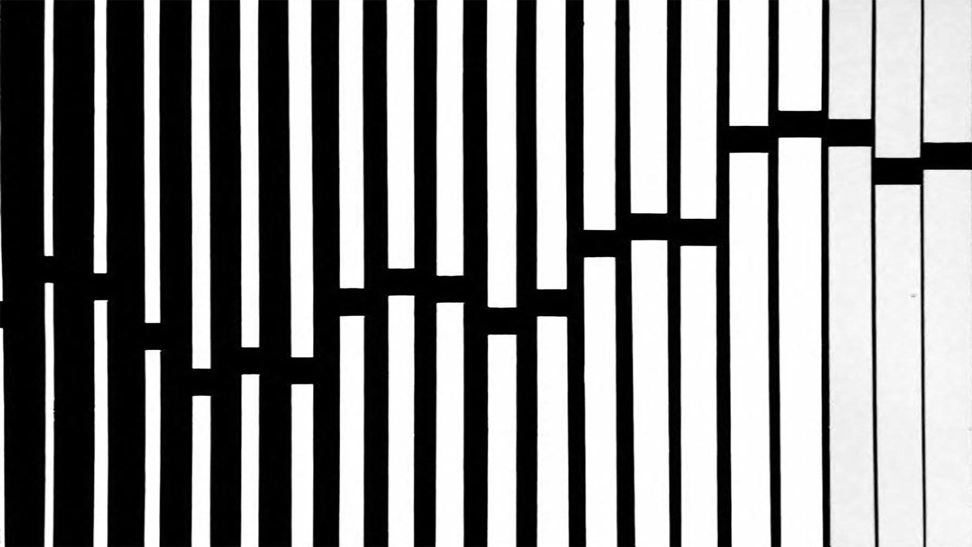 Smartphone displaying a gate control app with live camera feed from a Jamaican property